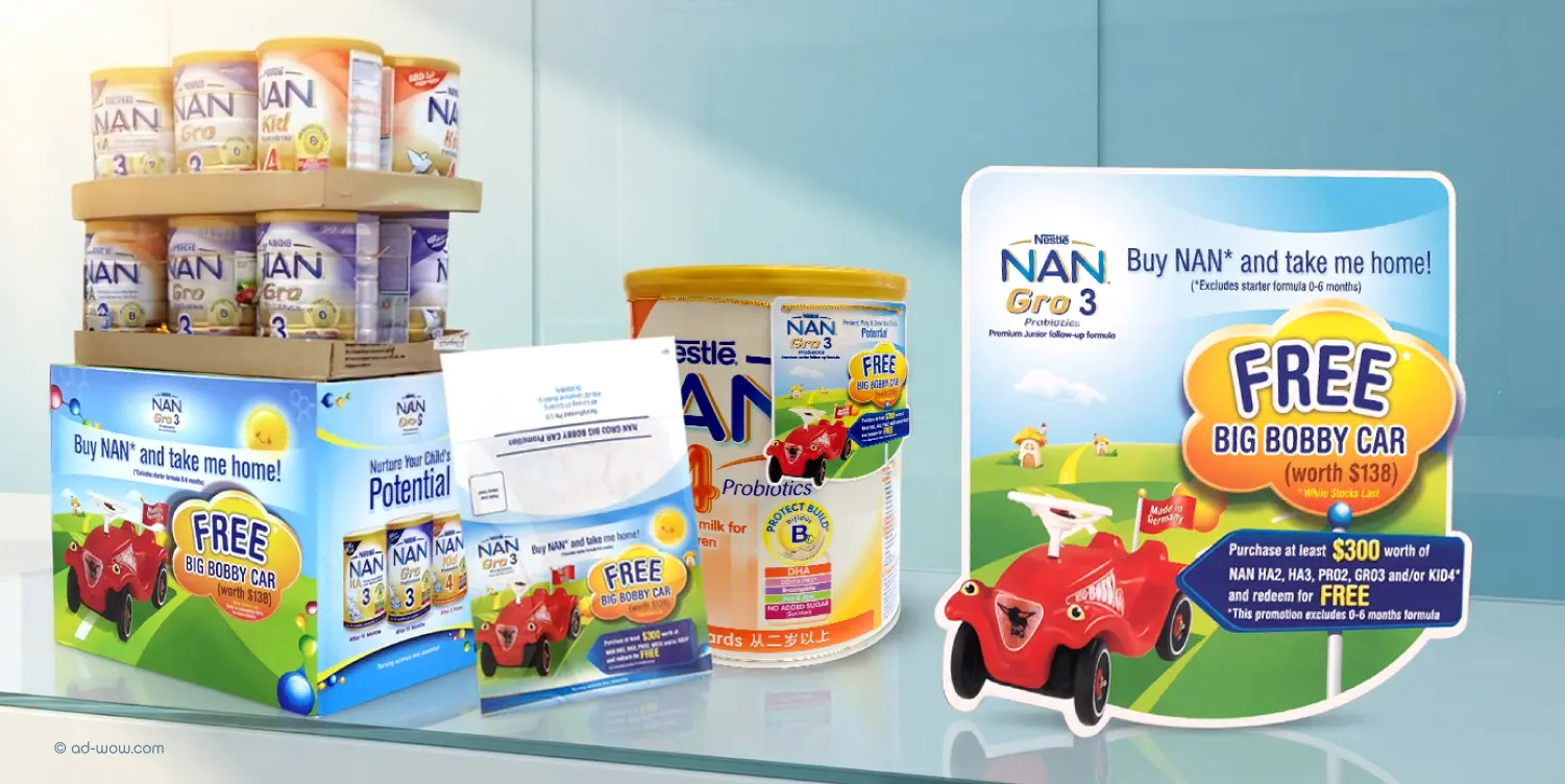 Nestlé NAN event collateral design featuring product cans and printed retail materials